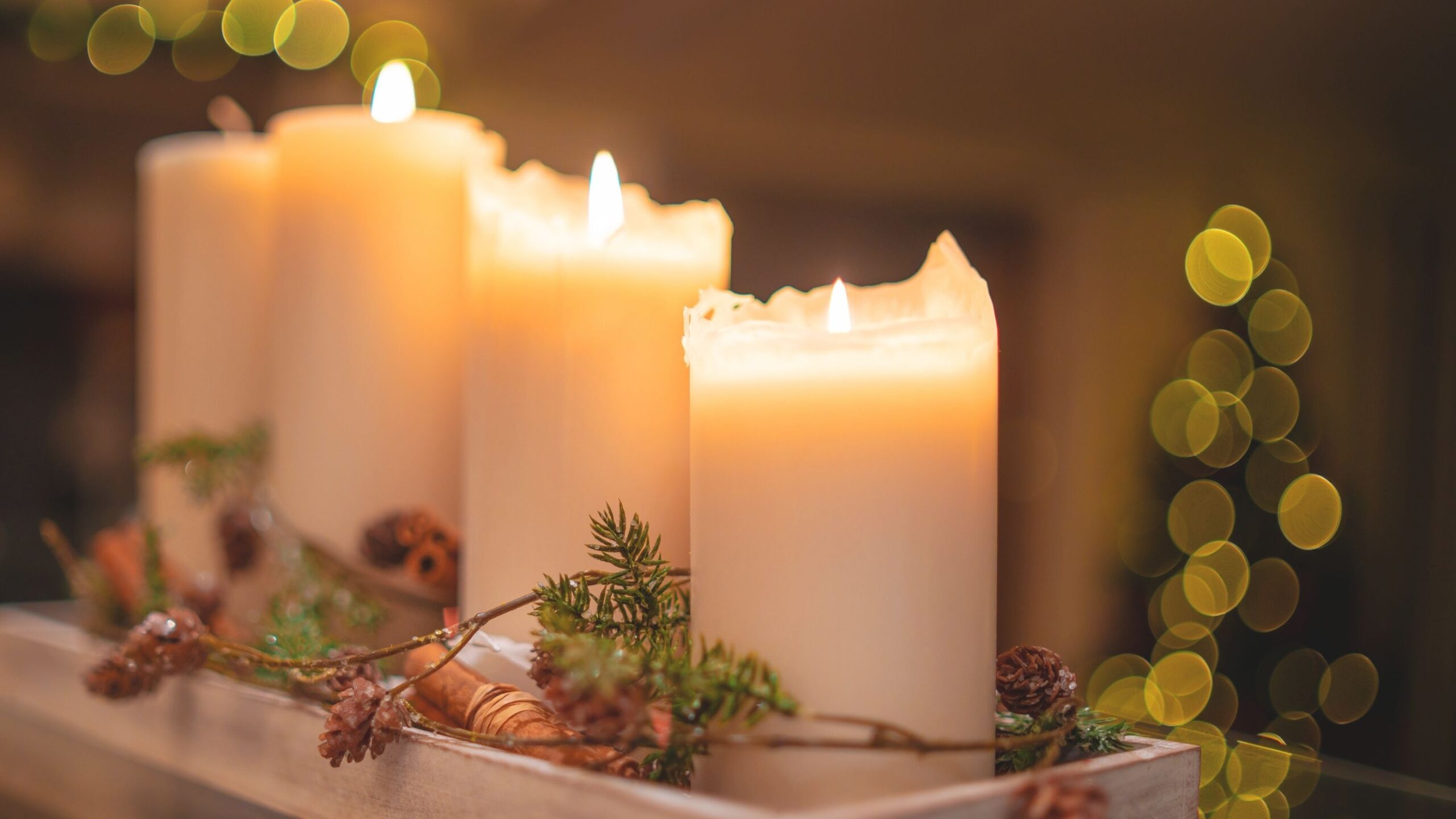Four lighted candles.